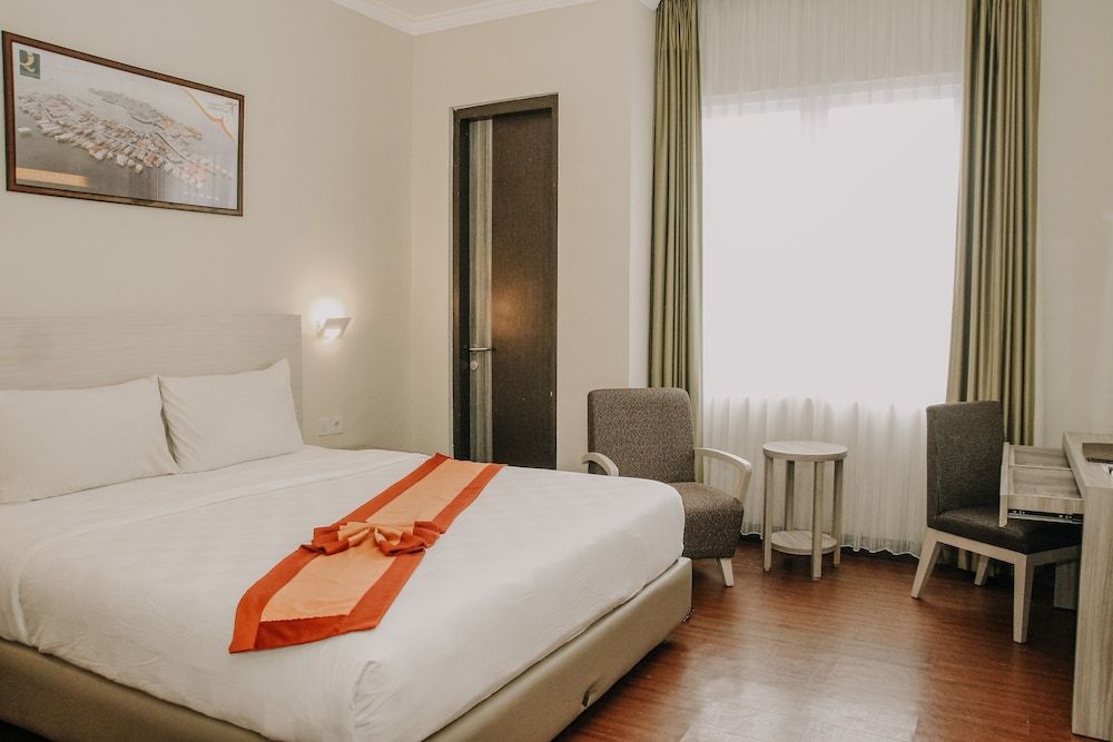 Grand Q Hotel Gorontalo Deluxe Double Room 2