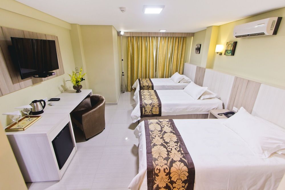 Megal Suites Hotel Deluxe Triple Room 3