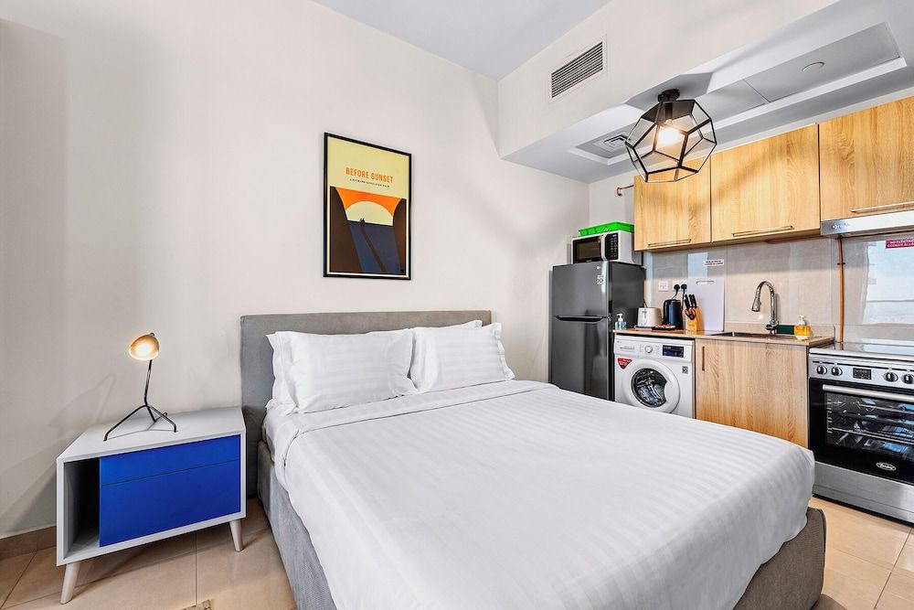 Unlock Metropolis Studio with Kitchen & Balcony 4