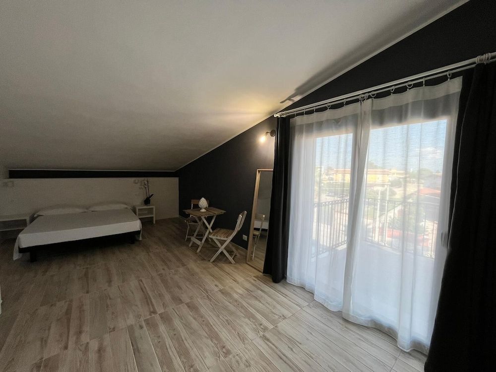 Amada Hotel Siracusa Quadruple Room