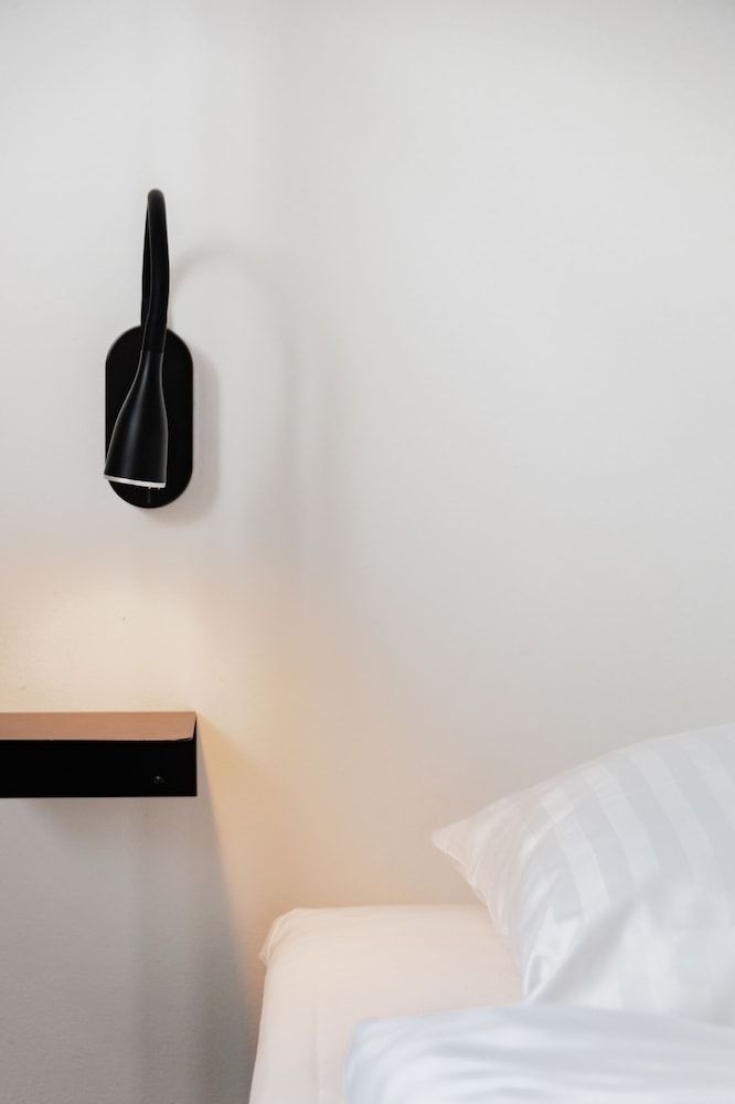 Sportium Sportel Classic Triple Room 12