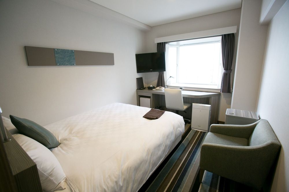 Small Double Room - Non-Smoking, Lounge Access and Complimentary Light Breakfast Included