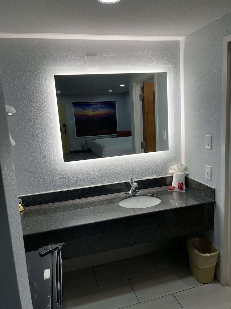 SureStay Hotel by Best Western Childress Standard Room, Multiple Beds, Non Smoking, Refrigerator & Microwave (1 king and 2 queen beds) 5