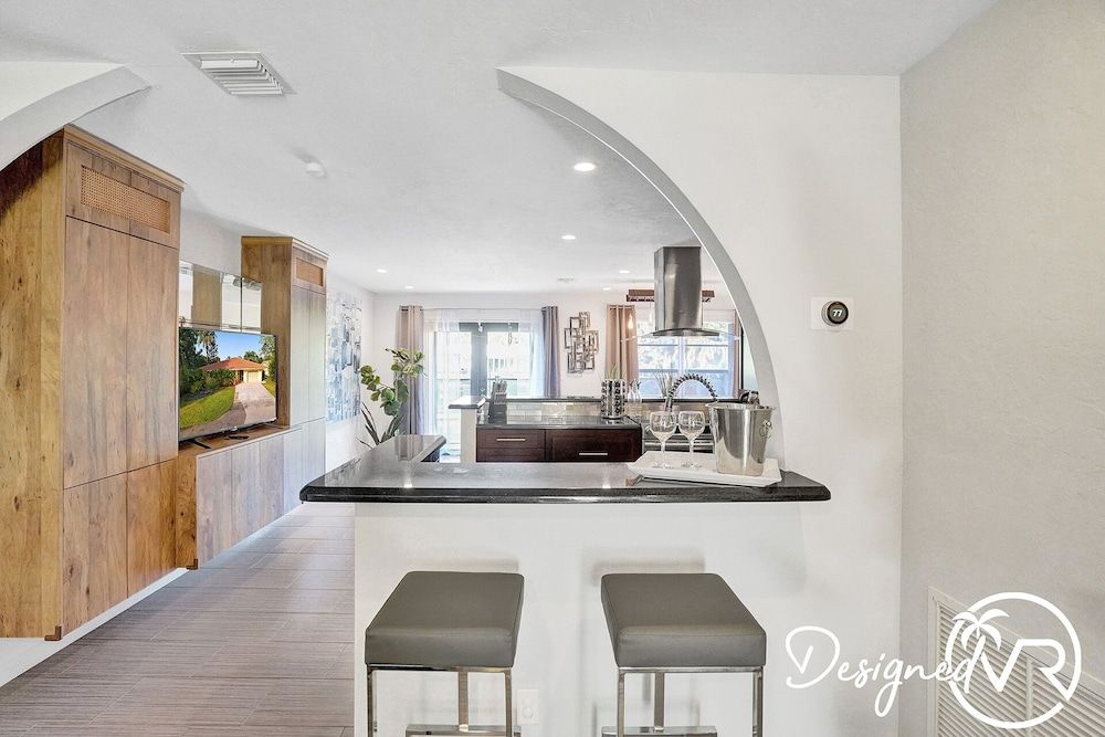 Stunning Waterfront 3BR with Heated POOL House 13