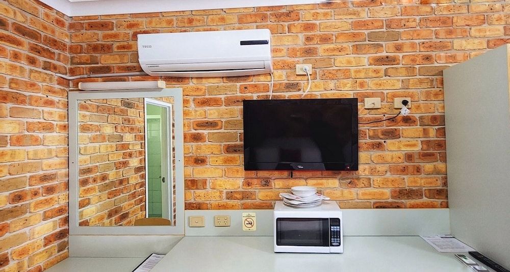 Golf Club Motor Inn Wingham Standard Triple Room, Non Smoking, Garden View 5