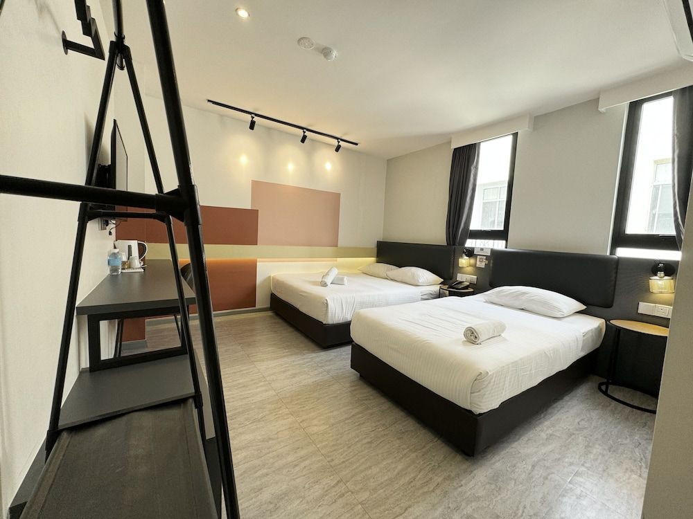 Woco Boutique Hotel Kinrara Deluxe Triple Window 3