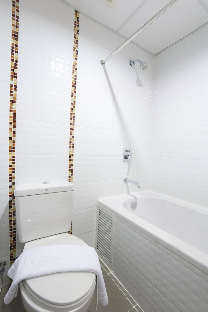 The Greenery Central Suites Deluxe Triple Room 4