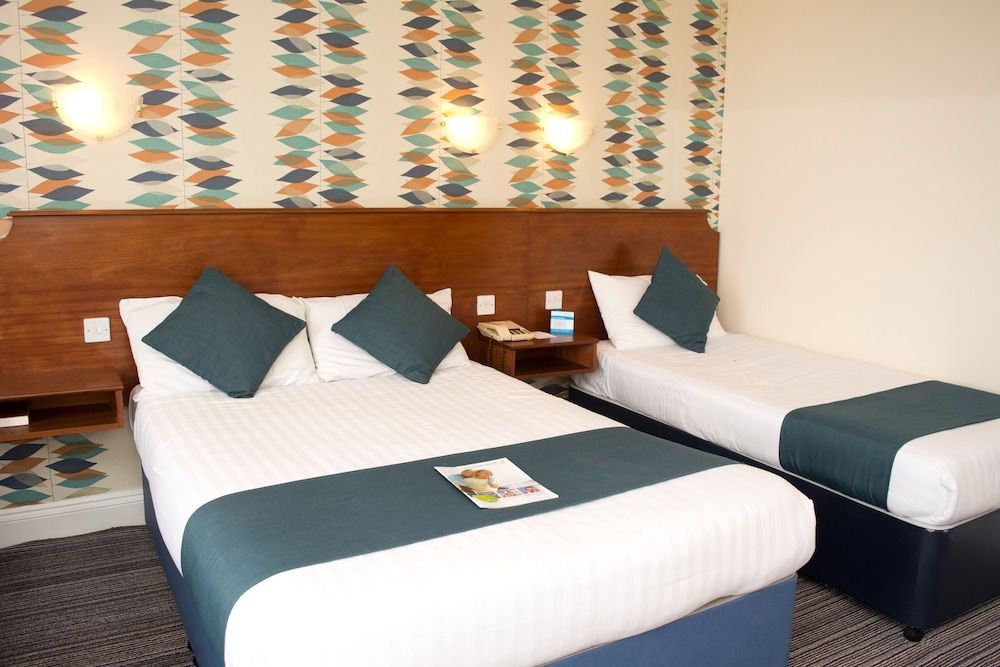Family Triple Room (2 Adults + 1 Child)