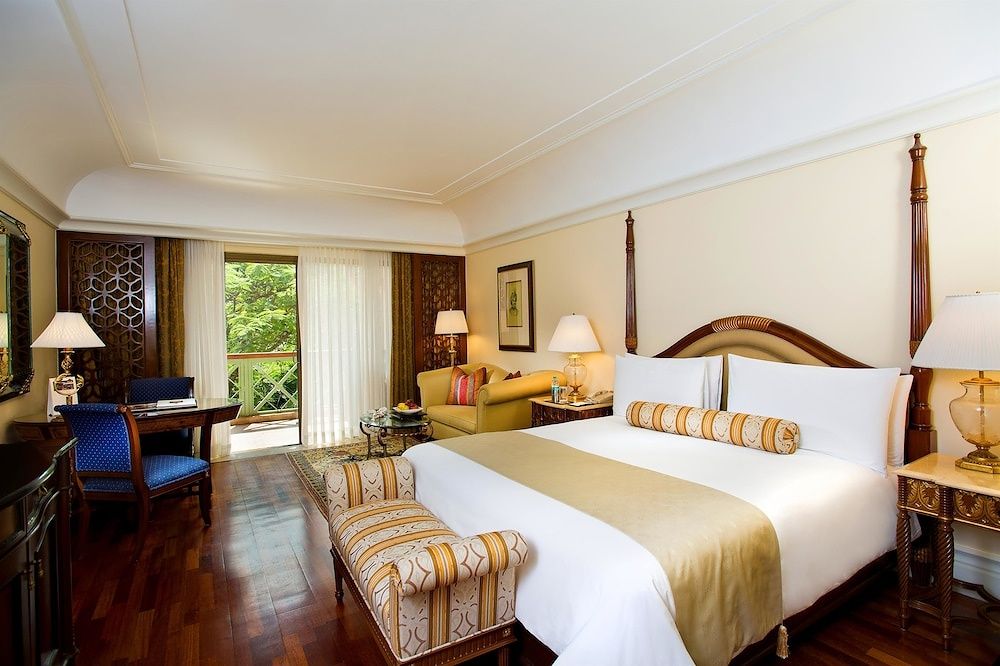The Leela Palace Bengaluru Deluxe Room with Balcony overlooking the Poolside or Garden 2