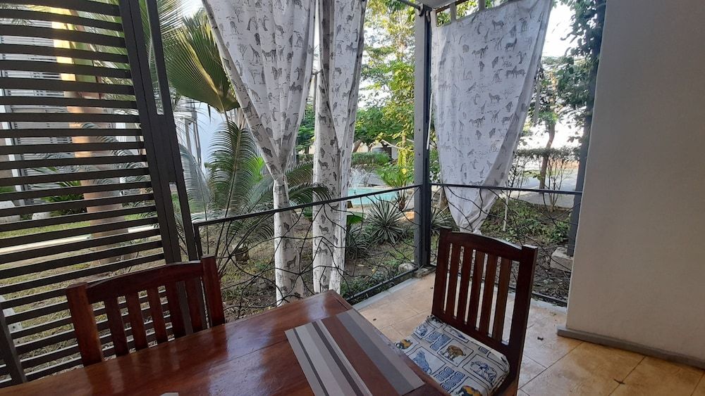 Aqua Resort Design Apartment, 1 King Bed with Sofa bed, Courtyard View 7