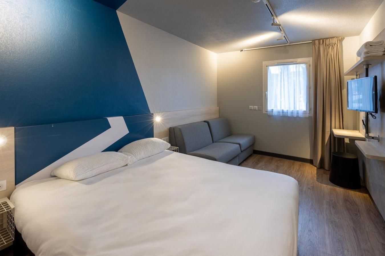Family Room with One Double and Two Single Beds