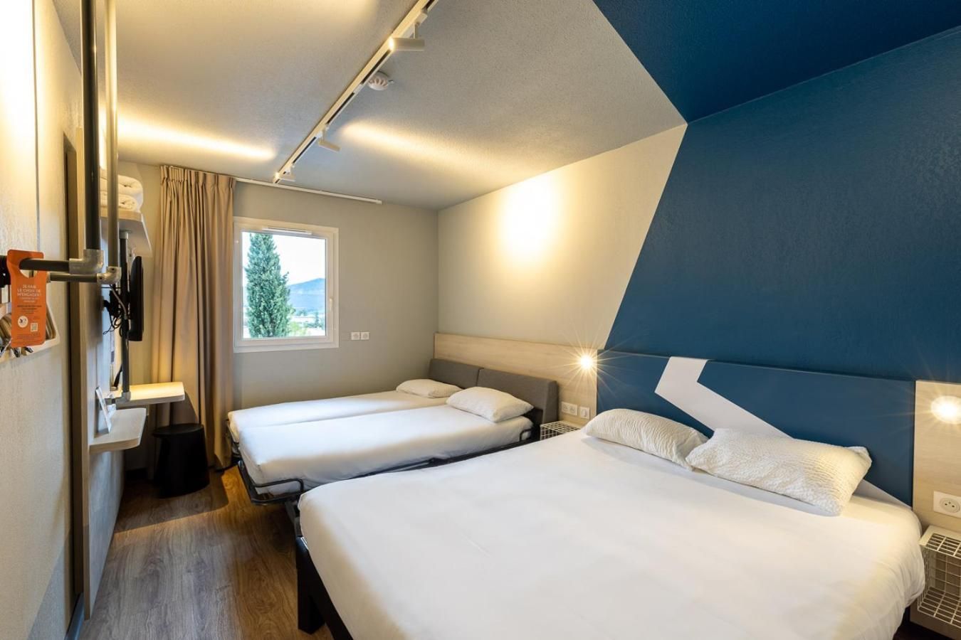 Family Room with One Double and Two Single Beds