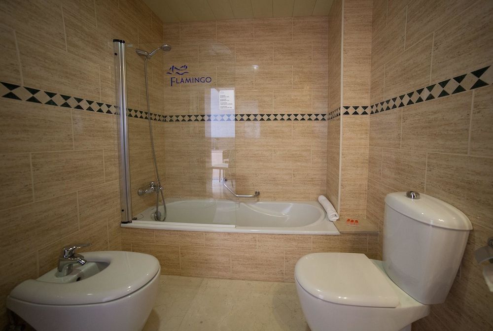 Triple Room (2 adultos + 2 niños)
