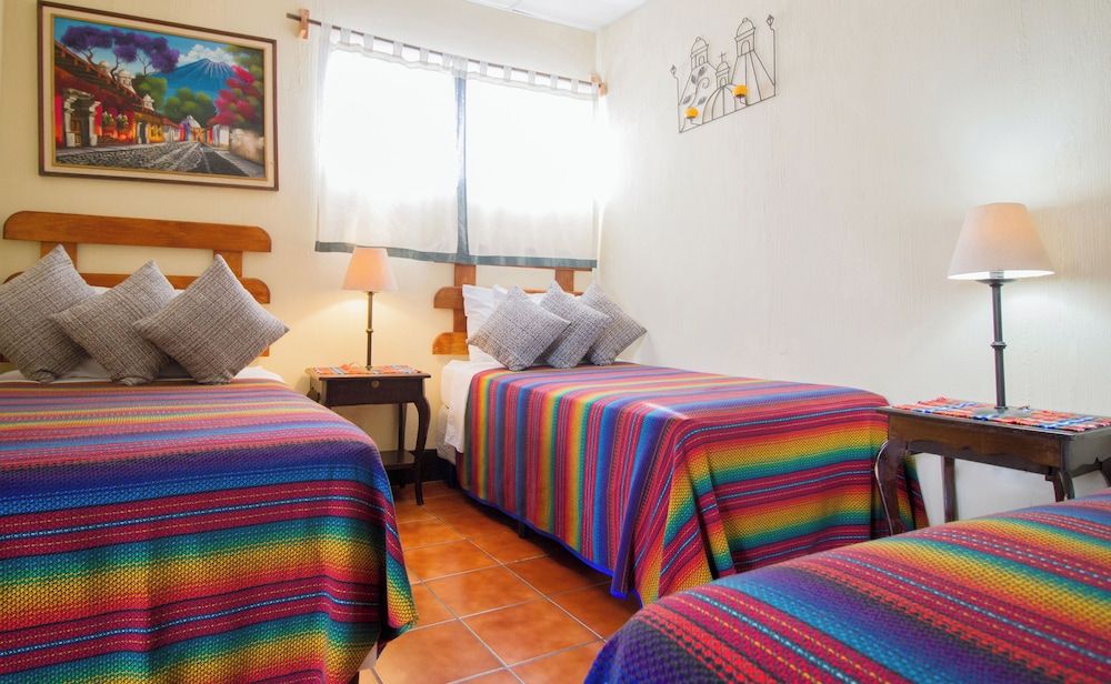 Posada Doña Luisa Standard Triple Room, Courtyard View 9