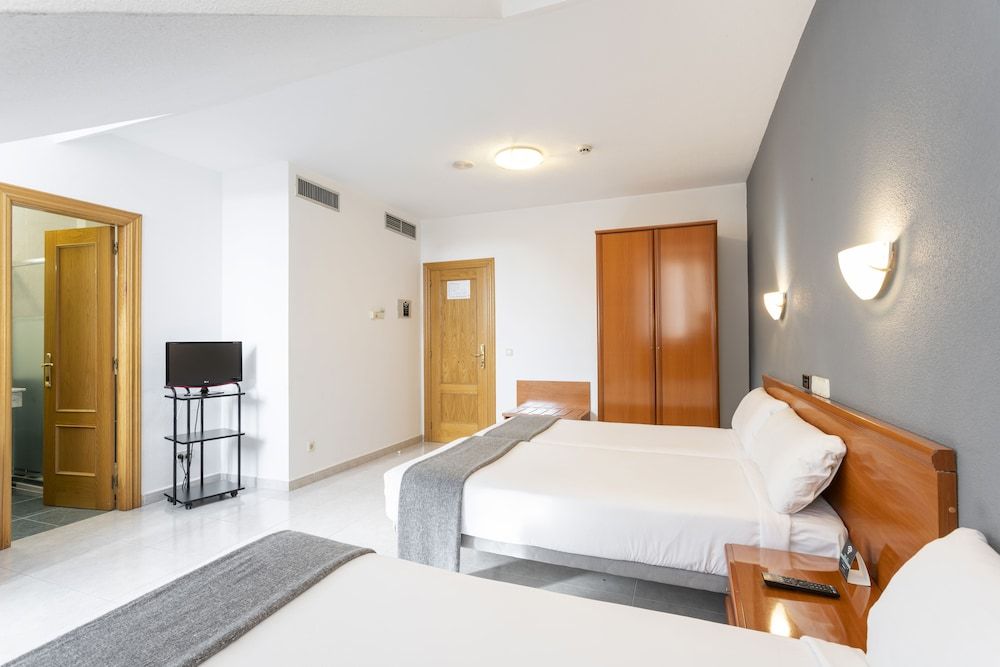 Double or Twin Room (with extra bed)