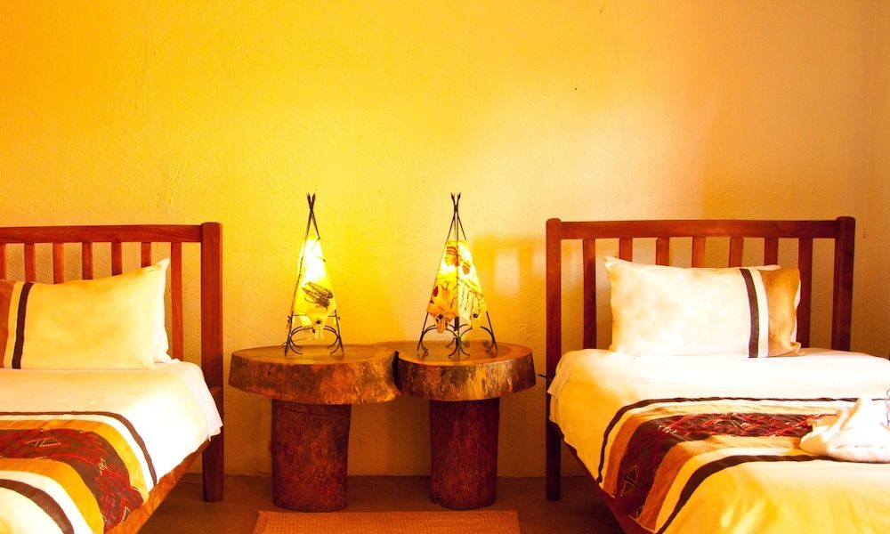 Gately Inn Entebbe Deluxe Cottage, Garden View 7