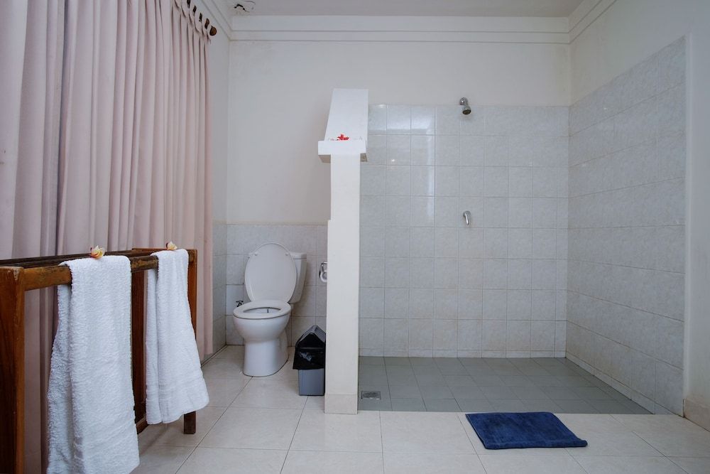 Villa Unggul Deluxe Double Room, Garden View 11