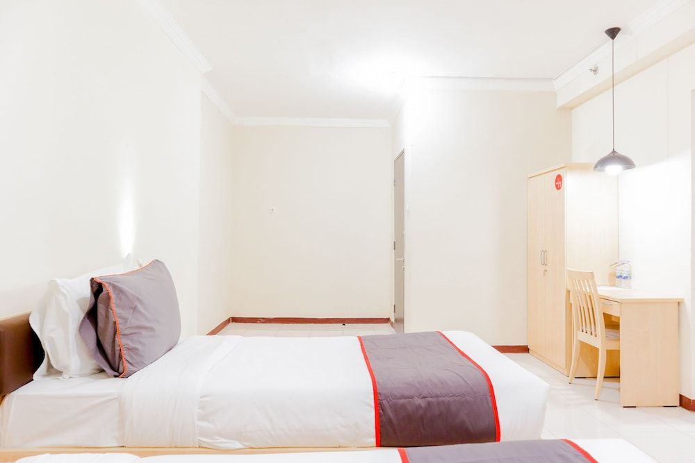 Collection O 6 Grand Palace Kemayoran Deluxe Twin Room 8