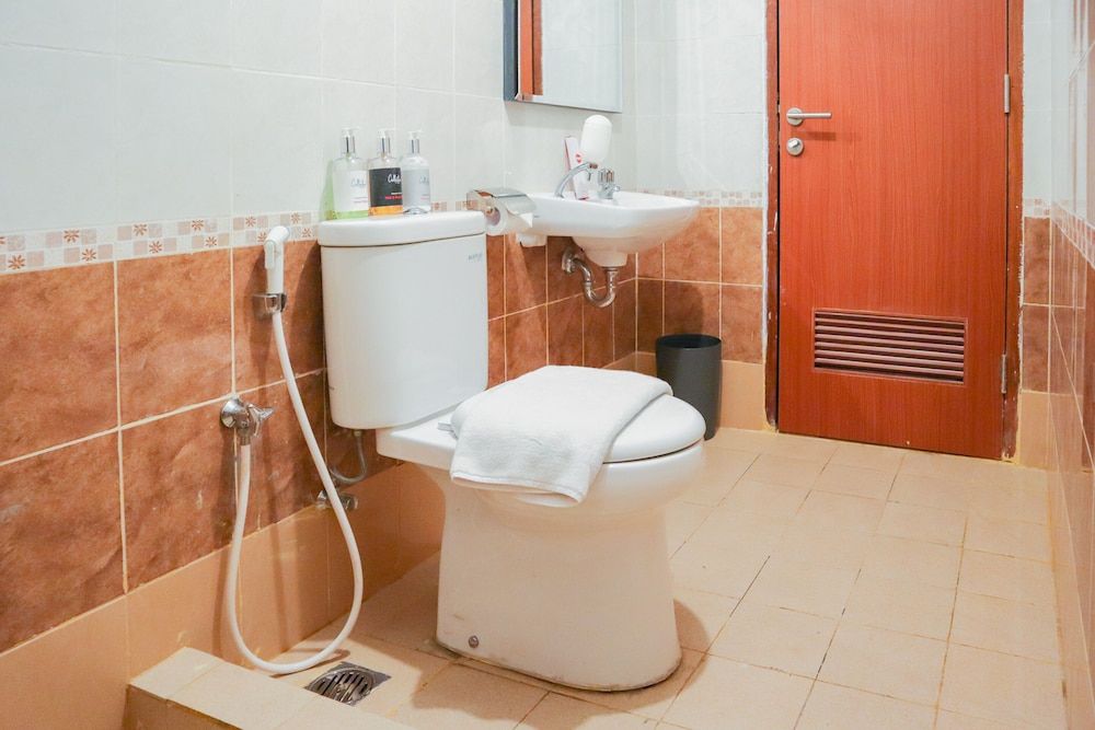 Collection O 6 Grand Palace Kemayoran Deluxe Twin Room 13