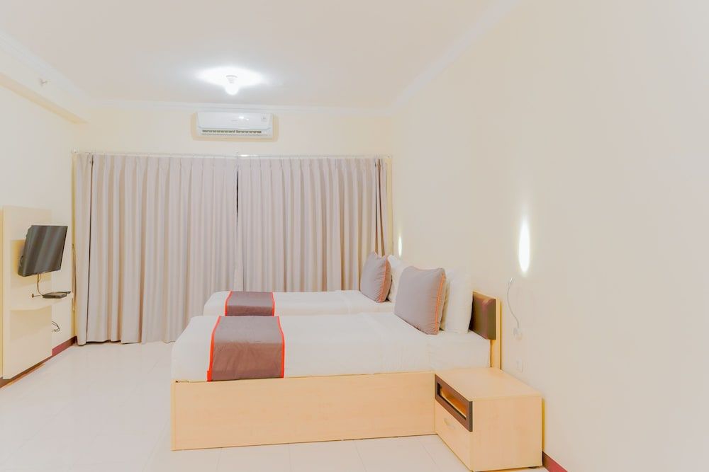 Collection O 6 Grand Palace Kemayoran Deluxe Twin Room 4