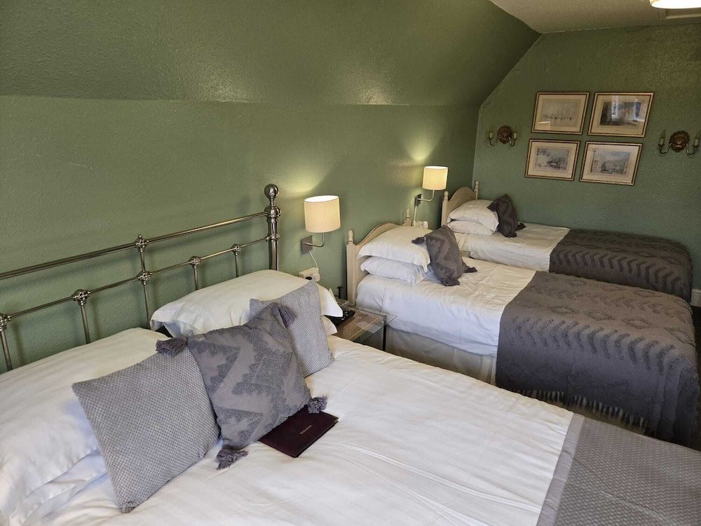 Family Quadruple Room (with Private External Bathroom)