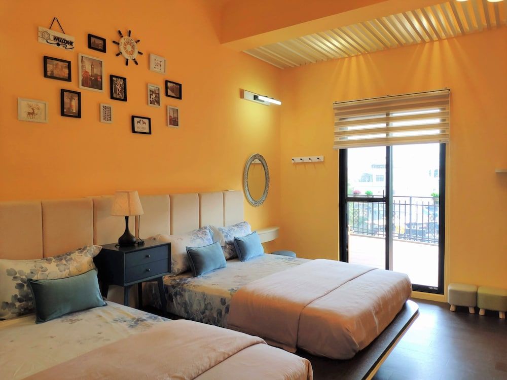 Teacher Cai Homestay Family Quadruple Room, Balcony, Partial Ocean View 5