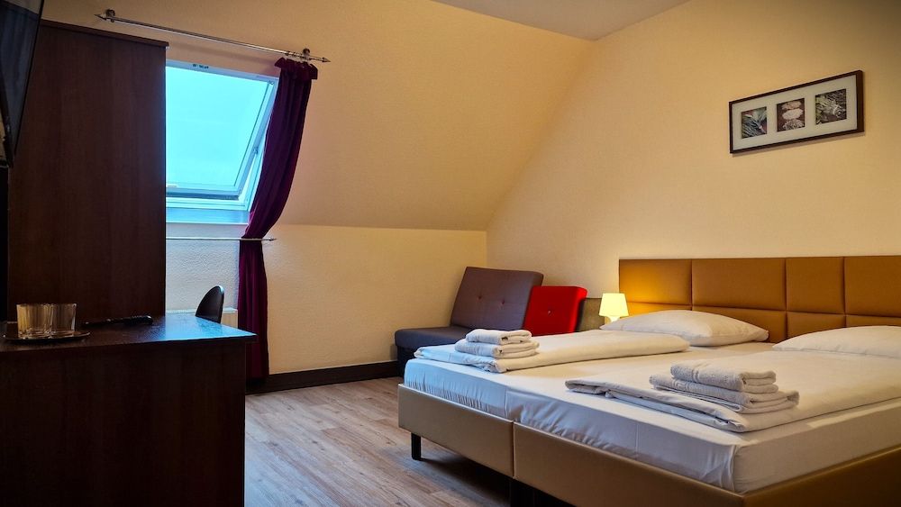 Mikon Eastgate Hotel Family Room for 2 adults and 1 child