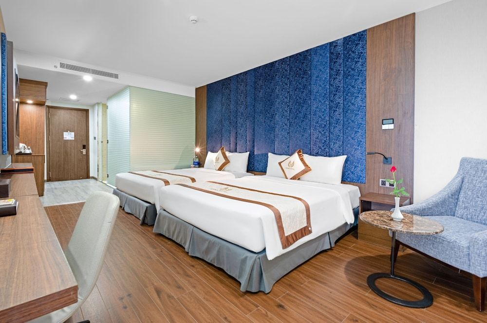 Deluxe Quadruple Room, 2 Queen Beds, Partial Sea View