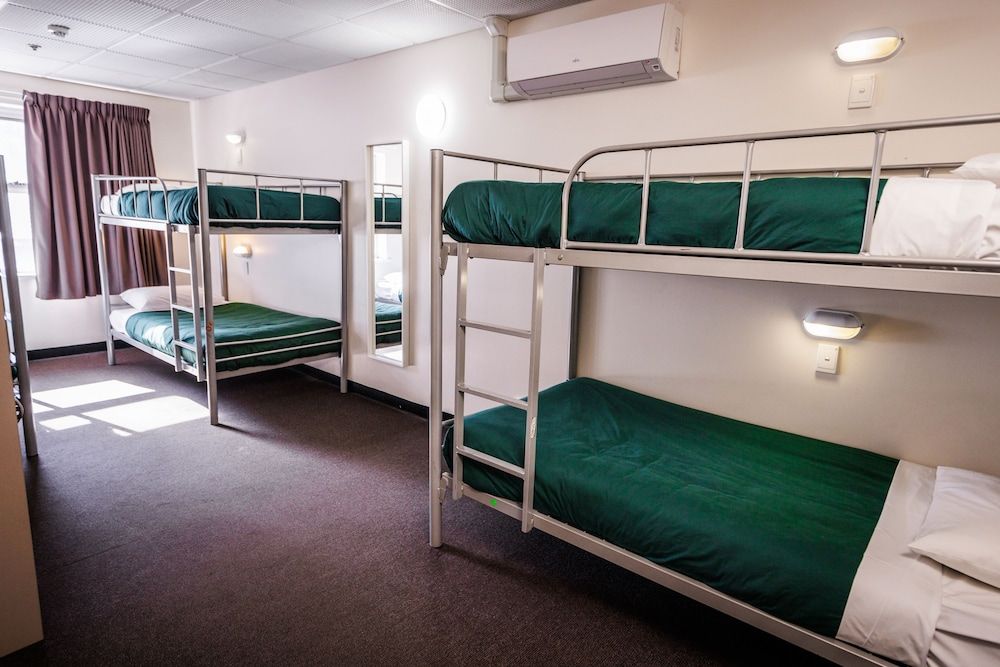 Bed in 6-Bed Male Dormitory with Shared Bathroom