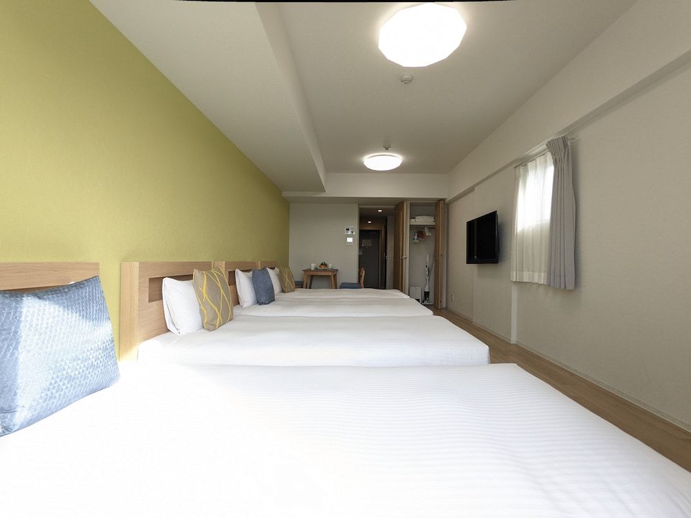 Deluxe Quadruple Room, Multiple Beds, Non Smoking, City View