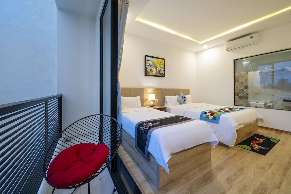 Q Villa Hoi An Deluxe Triple Room, Balcony 4