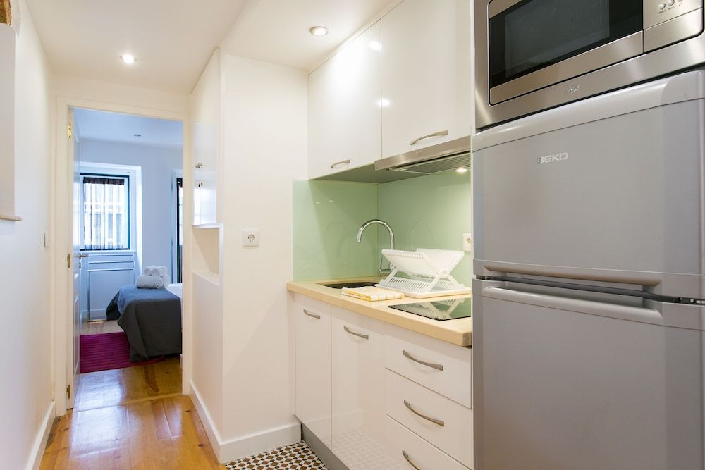 JOIVY Cosy 1-bed flat w/balcony in Alfama, moments from the Port Apartment, 1 Bedroom, Balcony, City View 10