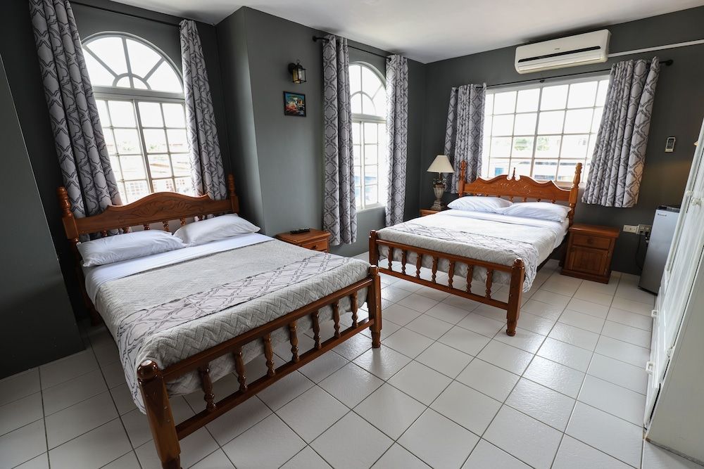 Comfort Quadruple Room, 2 Double Beds, Refrigerator, Garden View