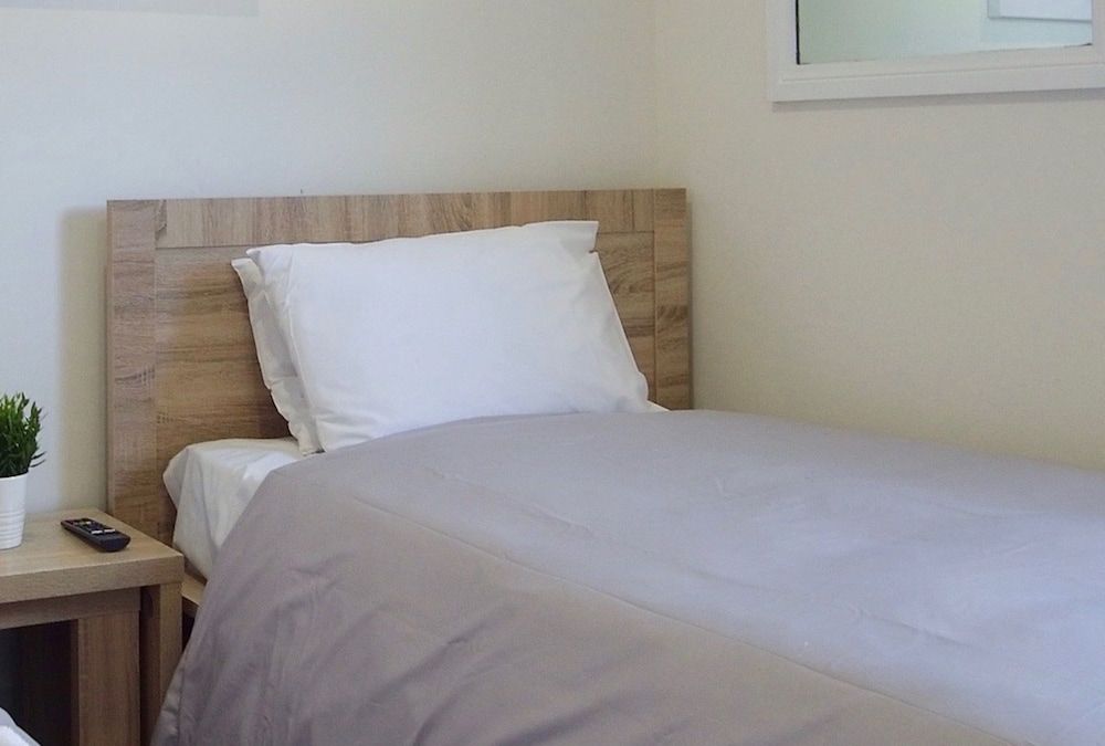 Basic Single Room Shared Bathroom