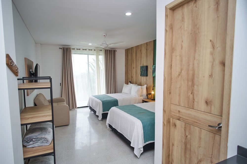 Hotel Arboreo Doradal Family Room 10