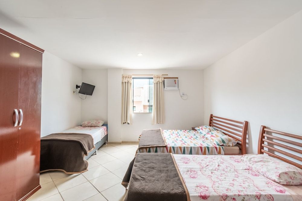 OYO Residencial Muriqui Apart Hotel, Mangaratiba Superior Quadruple Room (1 Double bed + 2 Single beds) 2