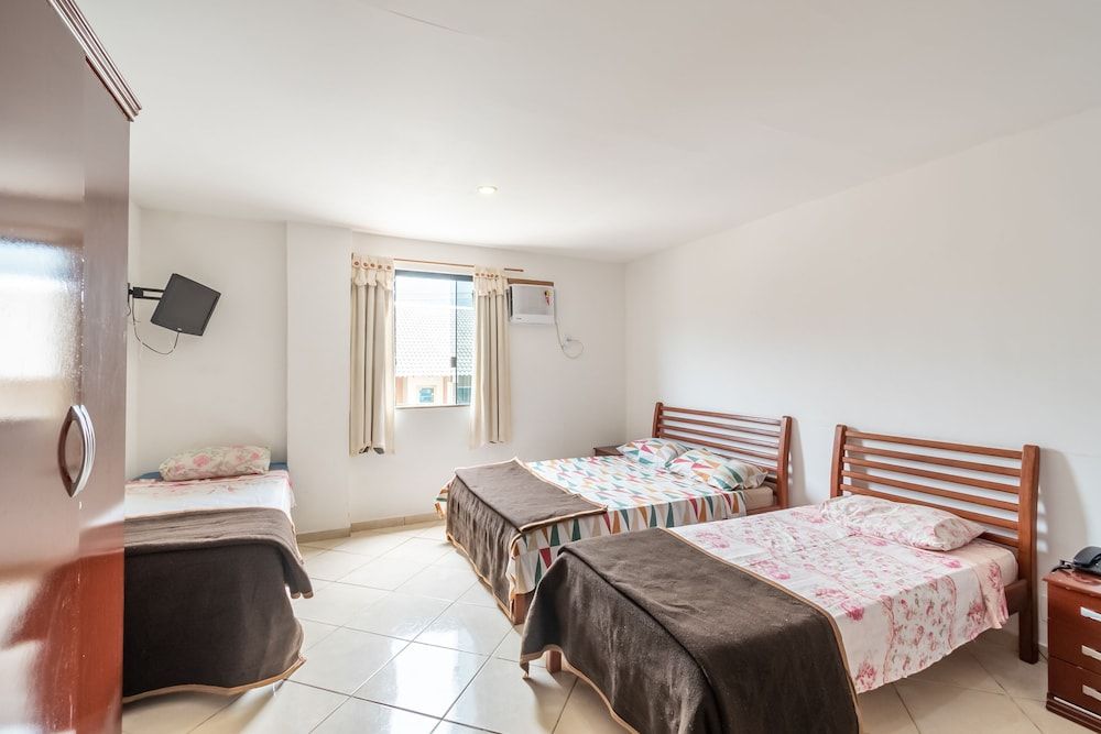 OYO Residencial Muriqui Apart Hotel, Mangaratiba Superior Quadruple Room (1 Double bed + 2 Single beds)