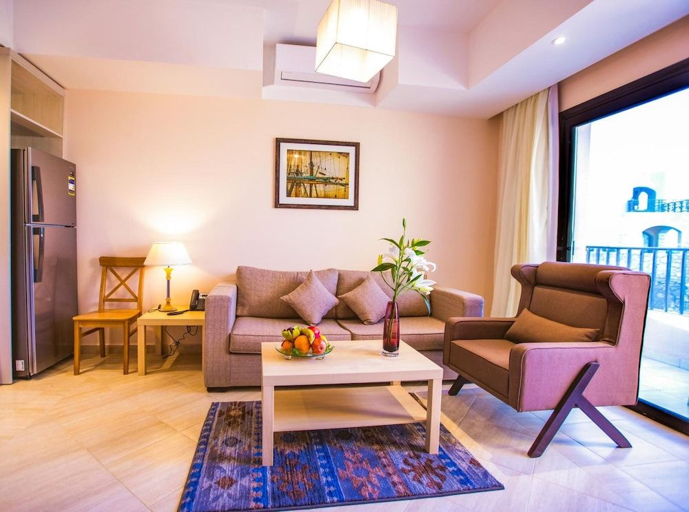 Sky View Suites Hotel Deluxe suite with Pool View, 1 Bedroom, kitchen, living 7