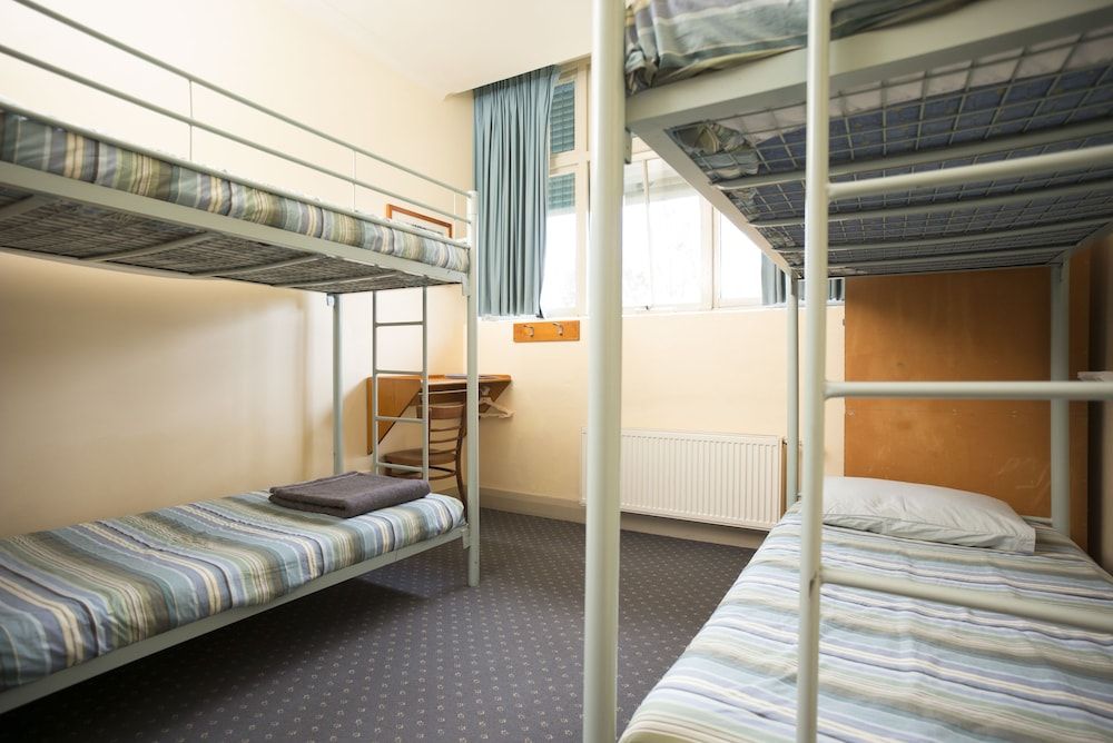 Bed in 4-Bed Male Dormitory with Shared Bathroom