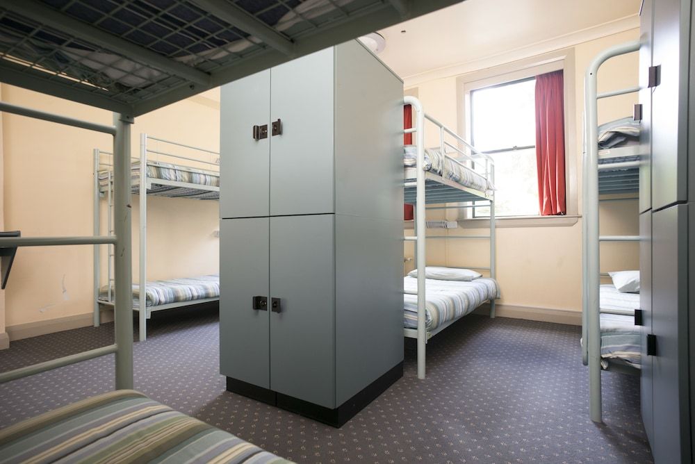 Bed in 8-Bed Female Dormitory with Shared Bathroom