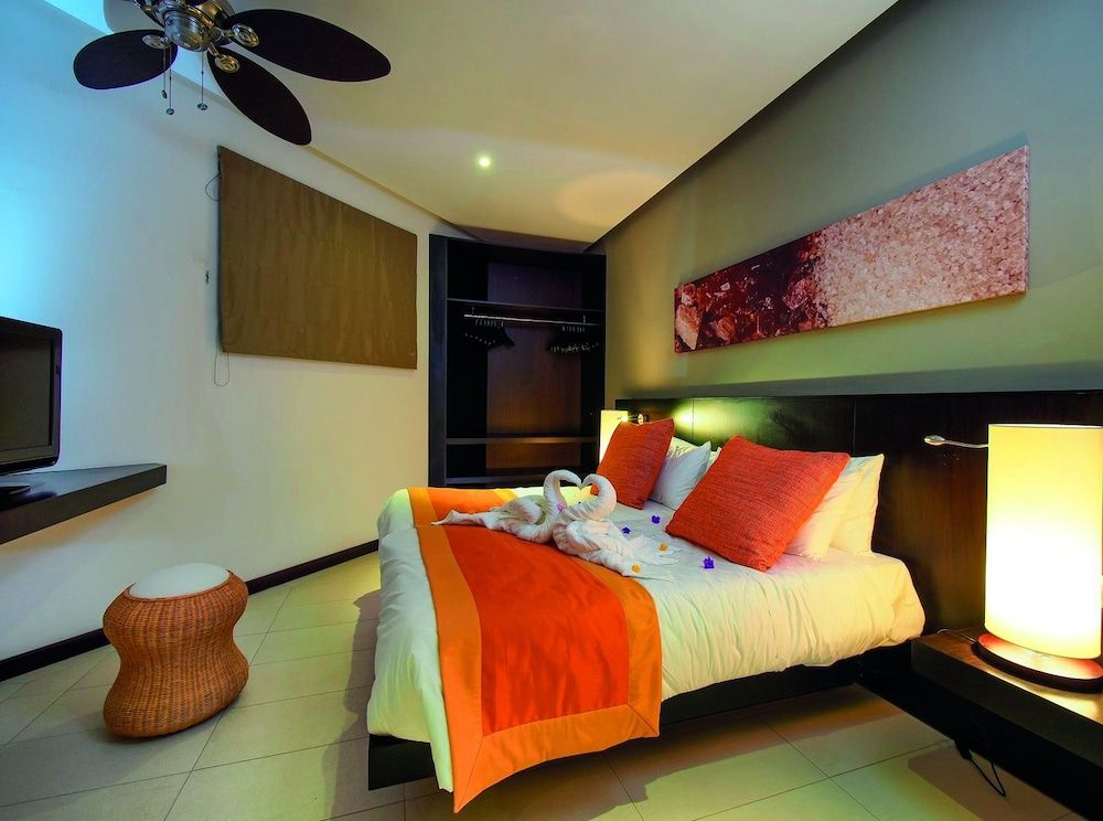 Crystals Beach Resort Belle Mare, a member of Radisson Individuals Premium Room, Garden View 3
