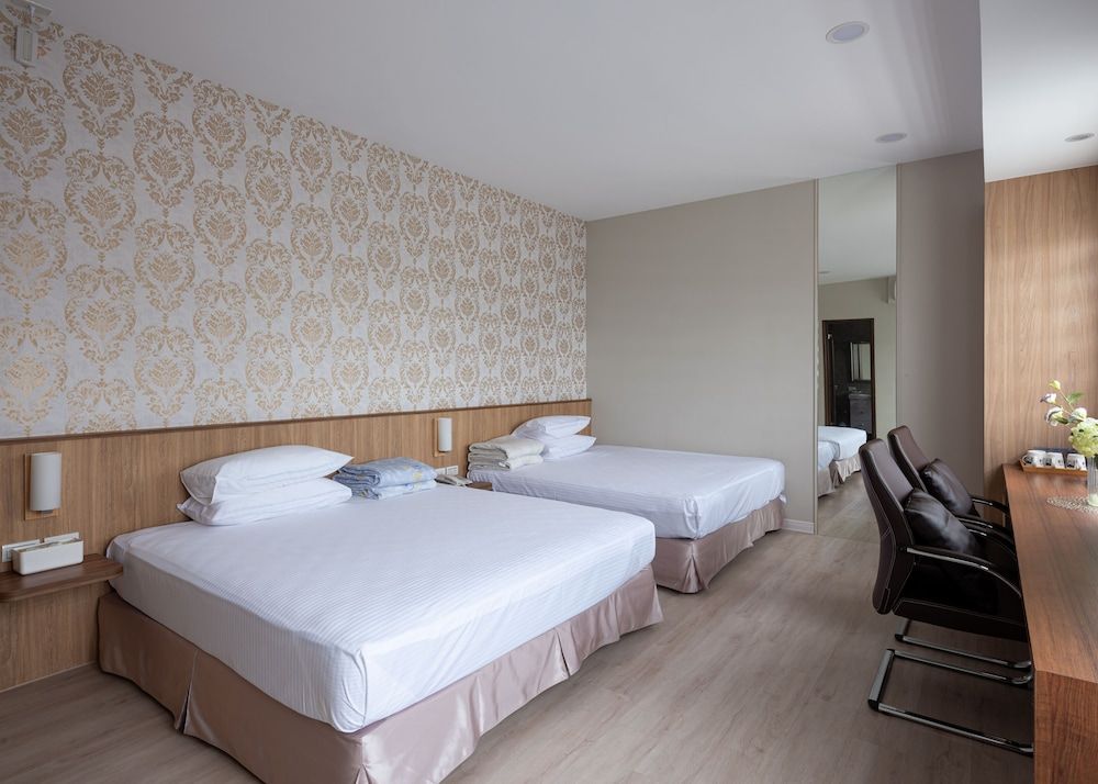 Minzu Hotel Comfort Quadruple Room 3