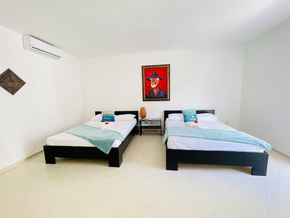 Solaz Boutique Hotel Standard Quadruple Room, 2 Queen Beds 4