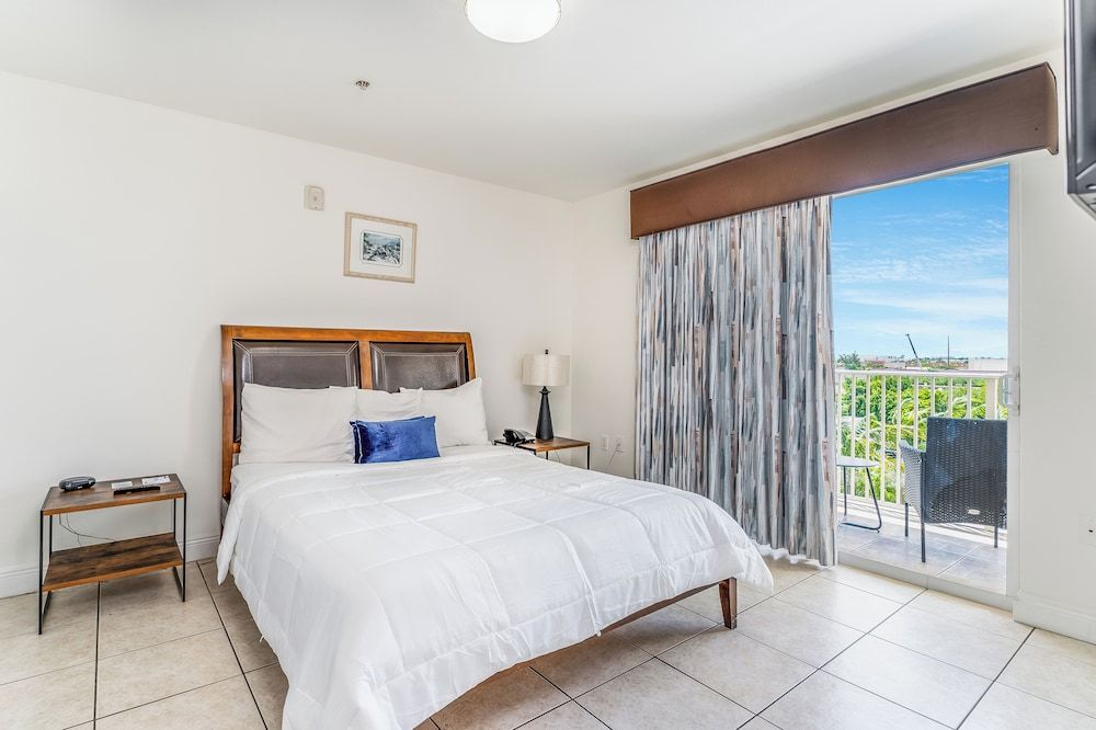Deluxe Suite, 2 Queen and Sofa Bed, 2 Bedroom, River View, Balcony