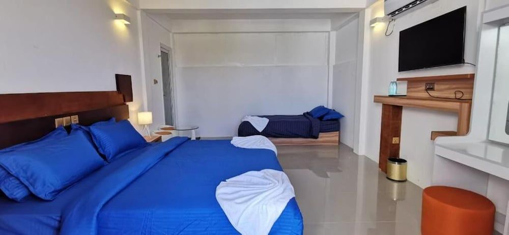 Sands Grand Hotel Deluxe Triple Room 2