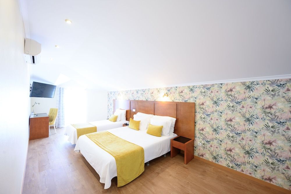 Recomeçar Guest House Triple Room 4