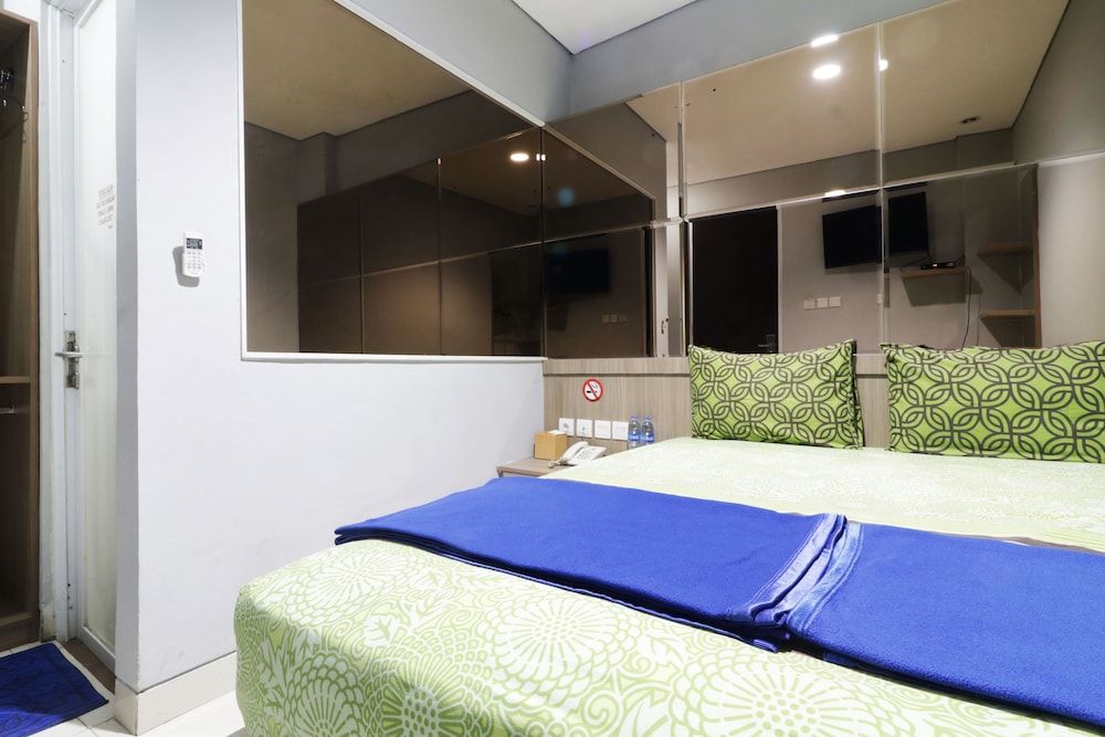 Wisma 9 Jakarta Deluxe Double Room 3