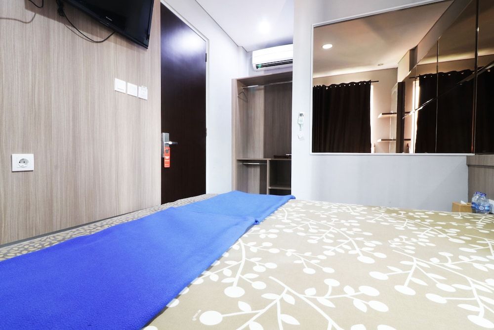 Wisma 9 Jakarta Deluxe Double Room 8