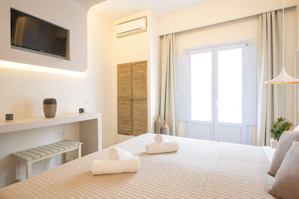 Light Blue Window Kamari Double or Twin Room 4