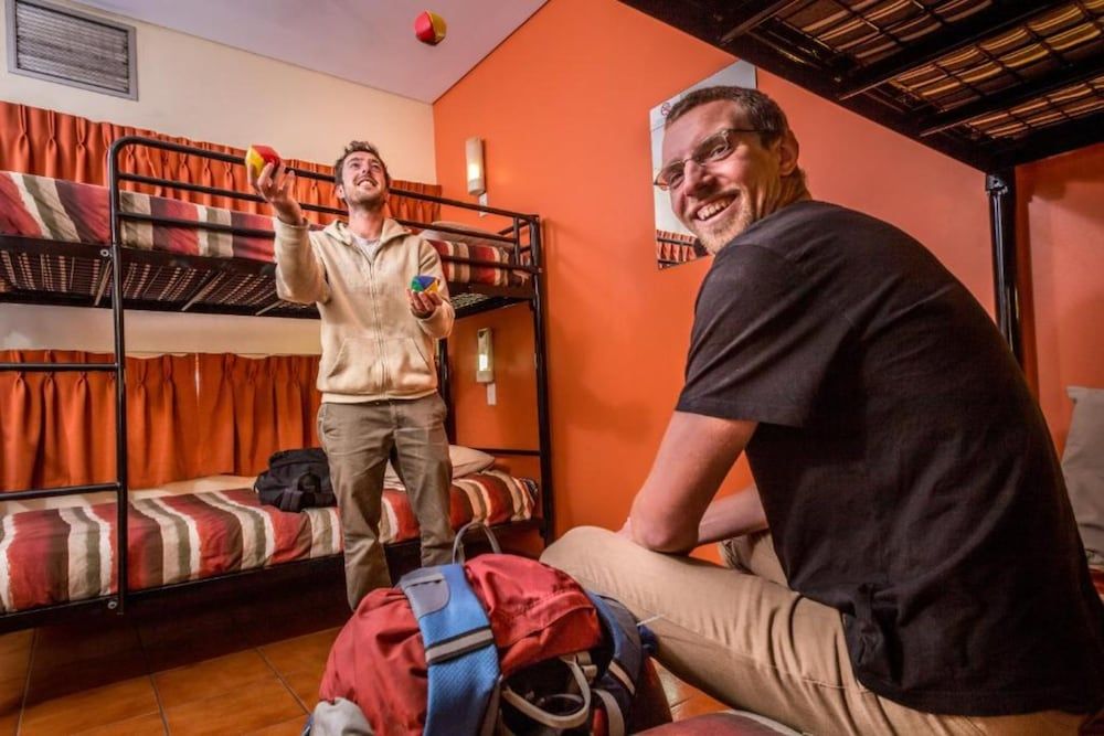 Bed in 4-Bed Male Dormitory with Shared Bathroom